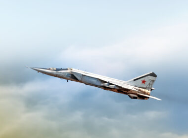 Russian air force Mig-25 foxbat supersonic military twin jet engine fighter interceptor aircraft warbird plane performing high speed pass aerial exterior view